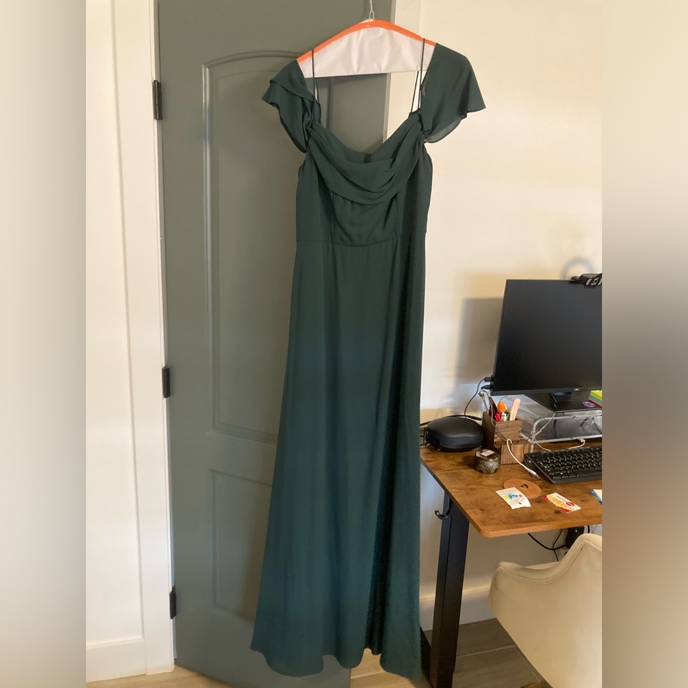 Green full-length gown with cap sleeves and V-neck